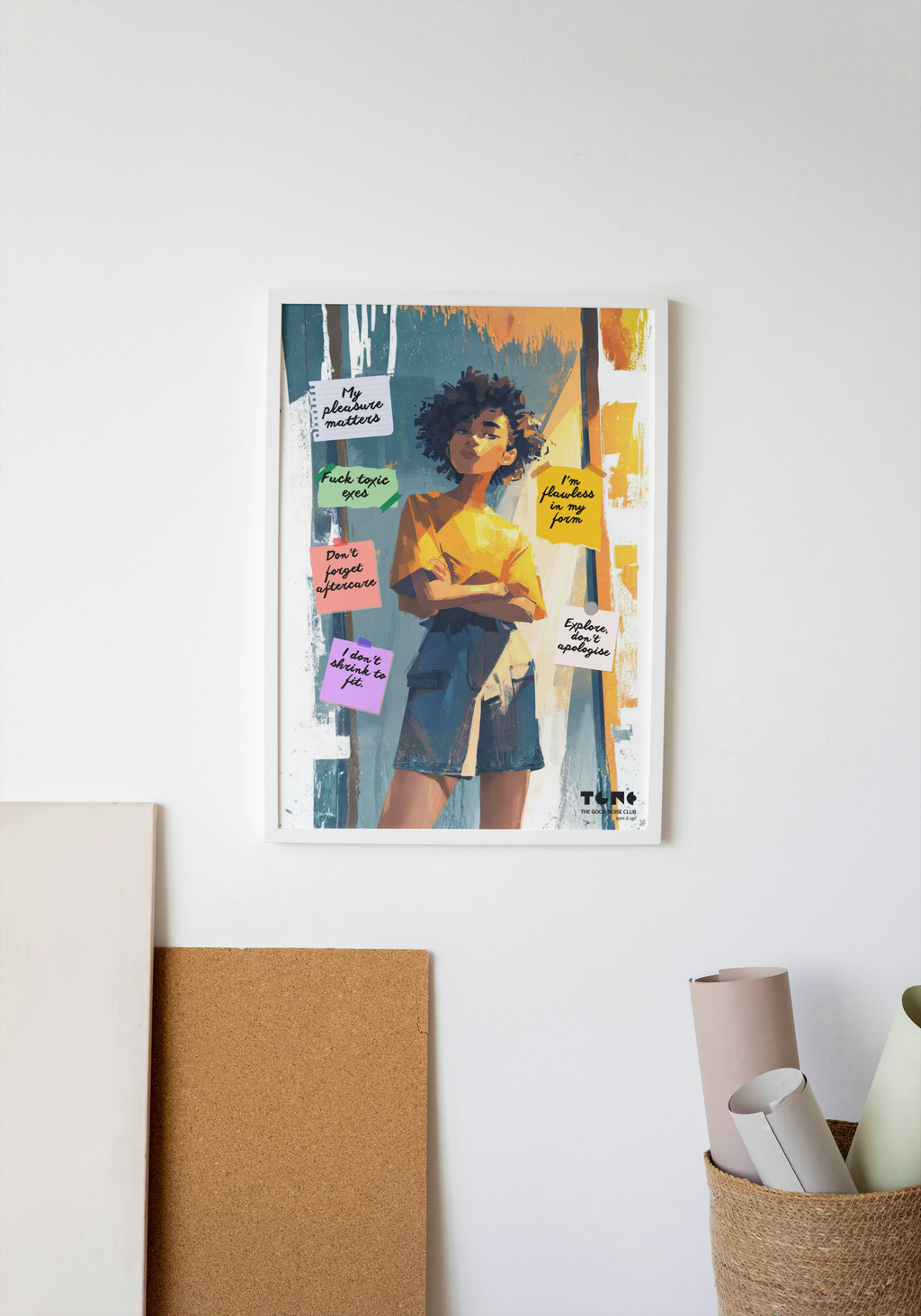 Framed artwork of a woman with colorful notes on a white wall.