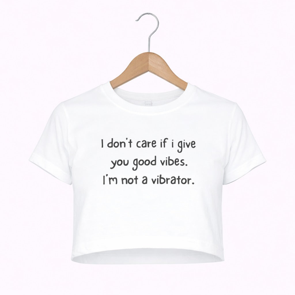 White t-shirt with text on a hanger against a white background
