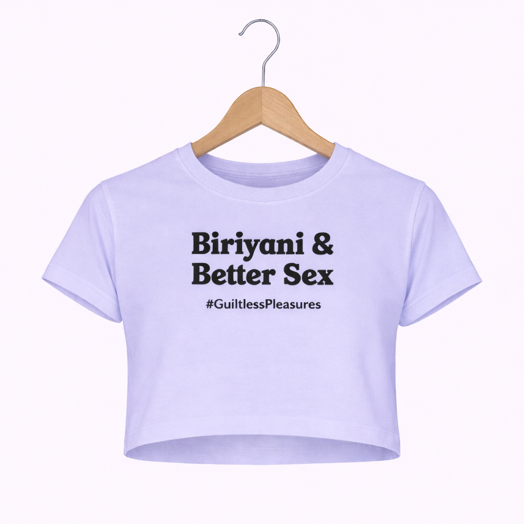 Light purple crop top with text on a hanger against a white background