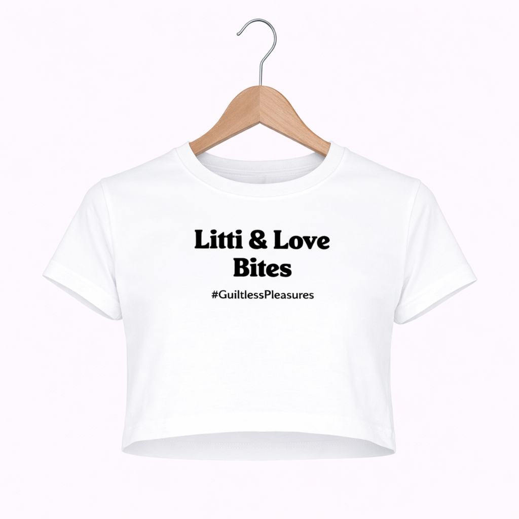 White crop top with text on a hanger against a white background