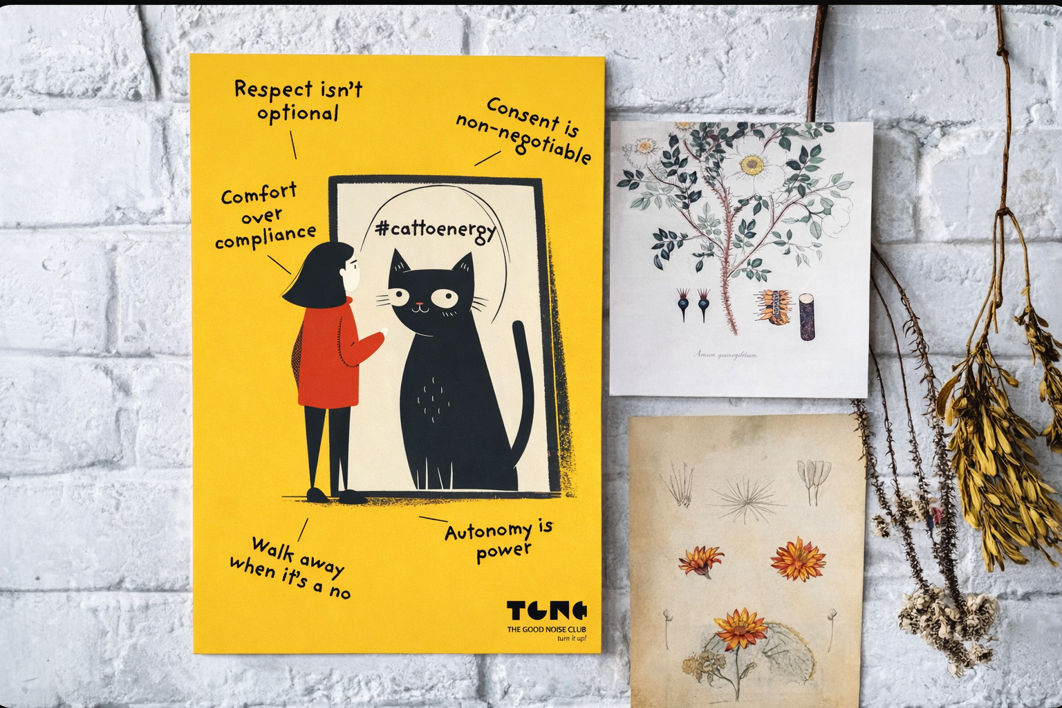 Three posters on a white brick wall with motivational text and graphics.