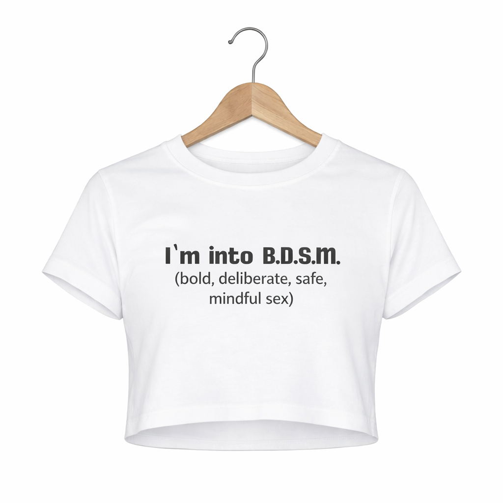 White crop top with text on a hanger against a white background