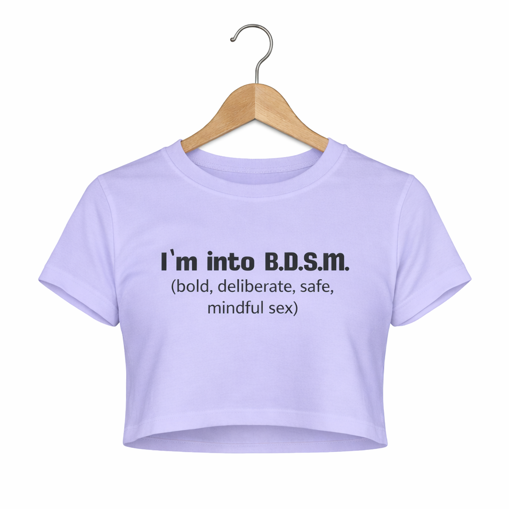Lavender crop top with text on a hanger against a white background