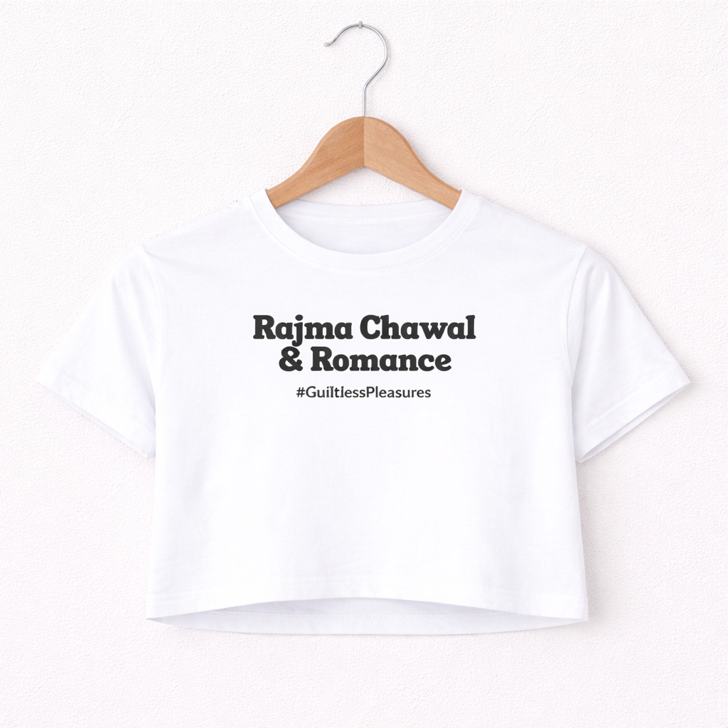 White t-shirt with text 'Rajma Chawal & Romance #GuiltlessPleasures' on a wooden hanger against a white background