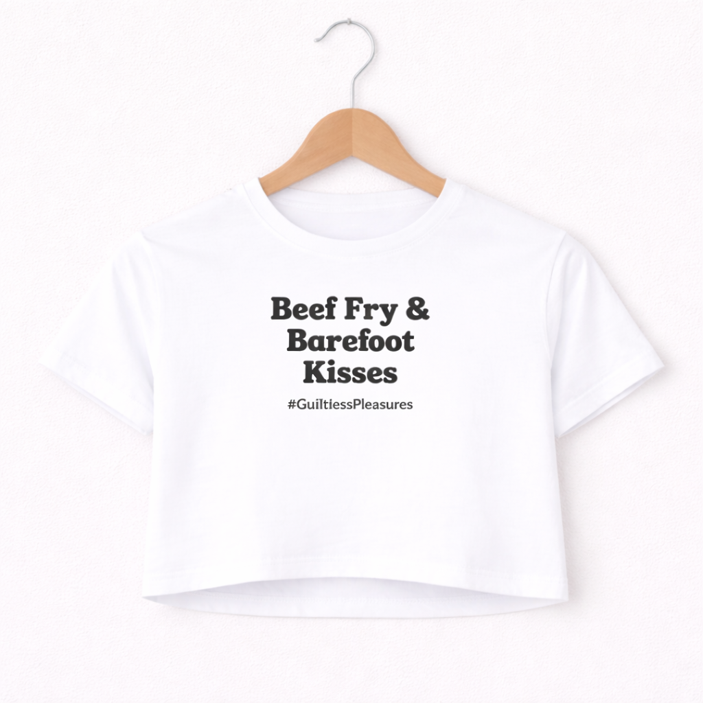 White t-shirt with text 'Beef Fry & Barefoot Kisses' on a hanger against a white background