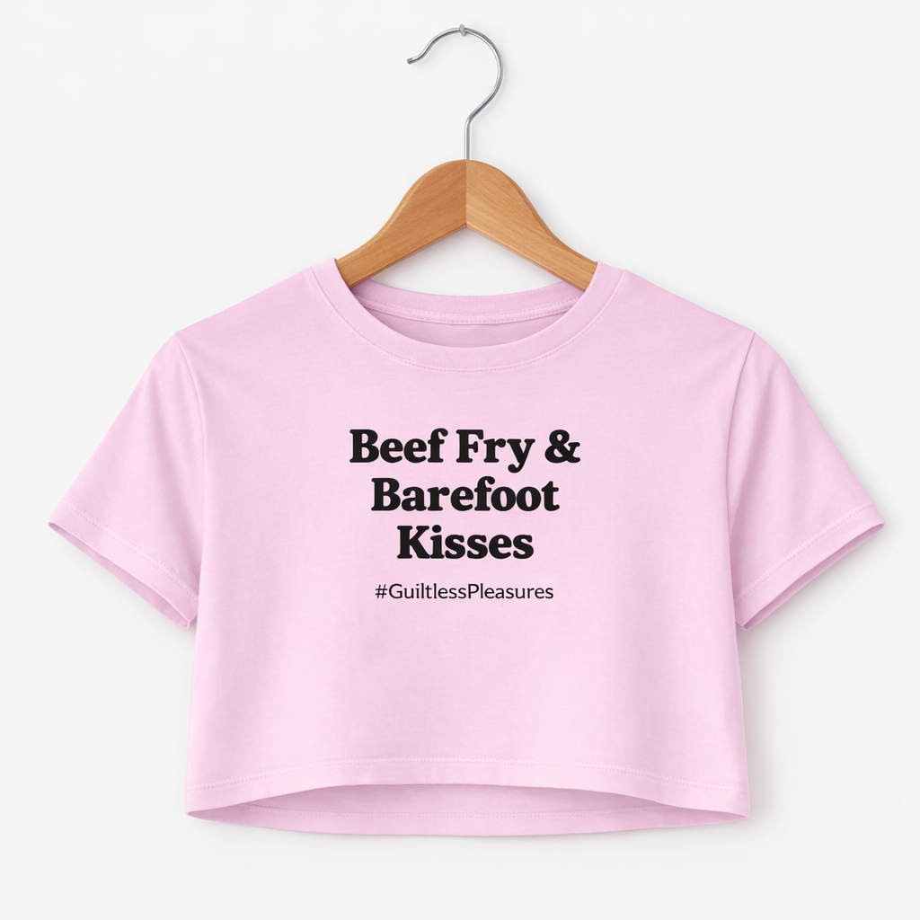 Pink crop top with text on a hanger against a white background
