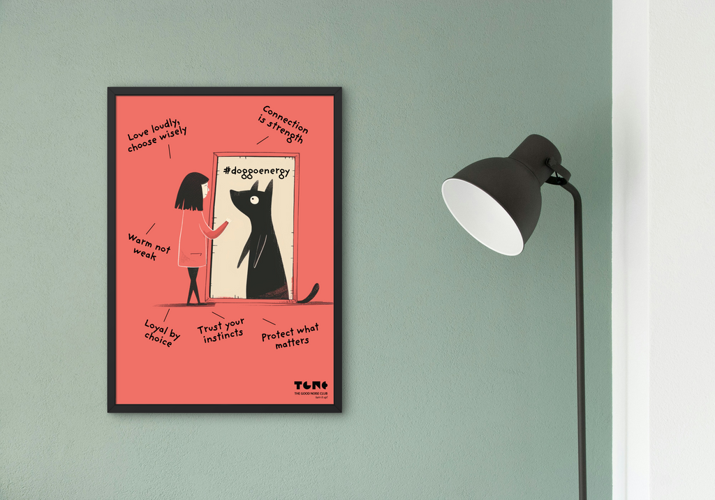 Framed poster with a red background and black text and illustrations on a green wall.