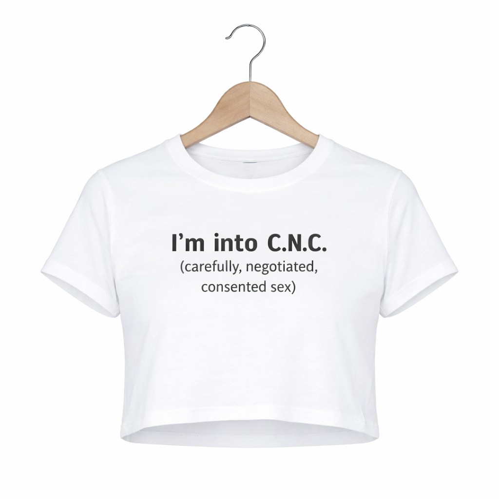 White crop top with text on a hanger against a white background