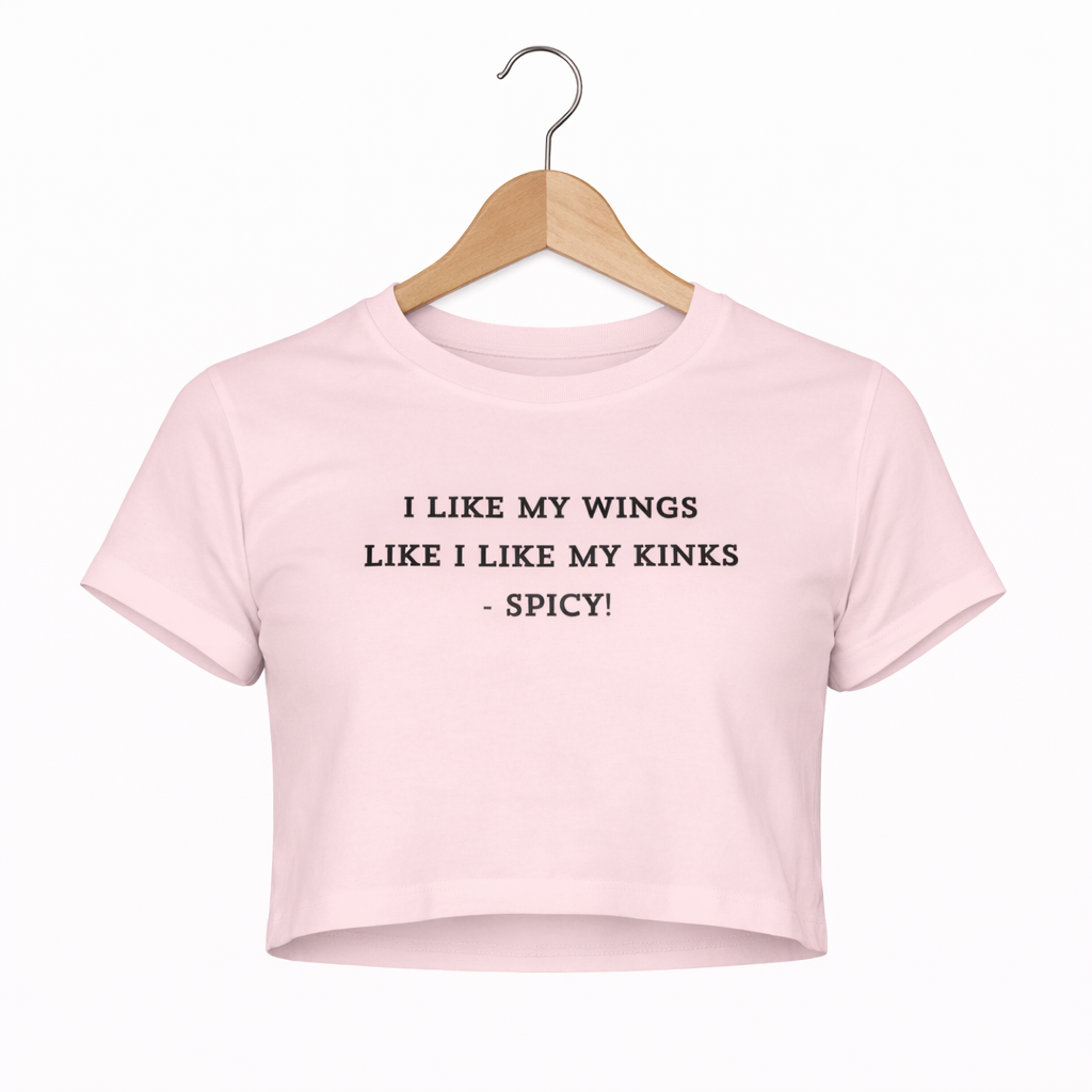 Pink crop top with text on a white background