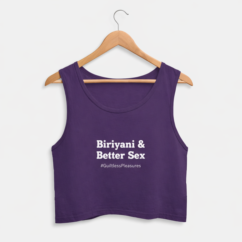 Purple tank top with text on a hanger against a white background