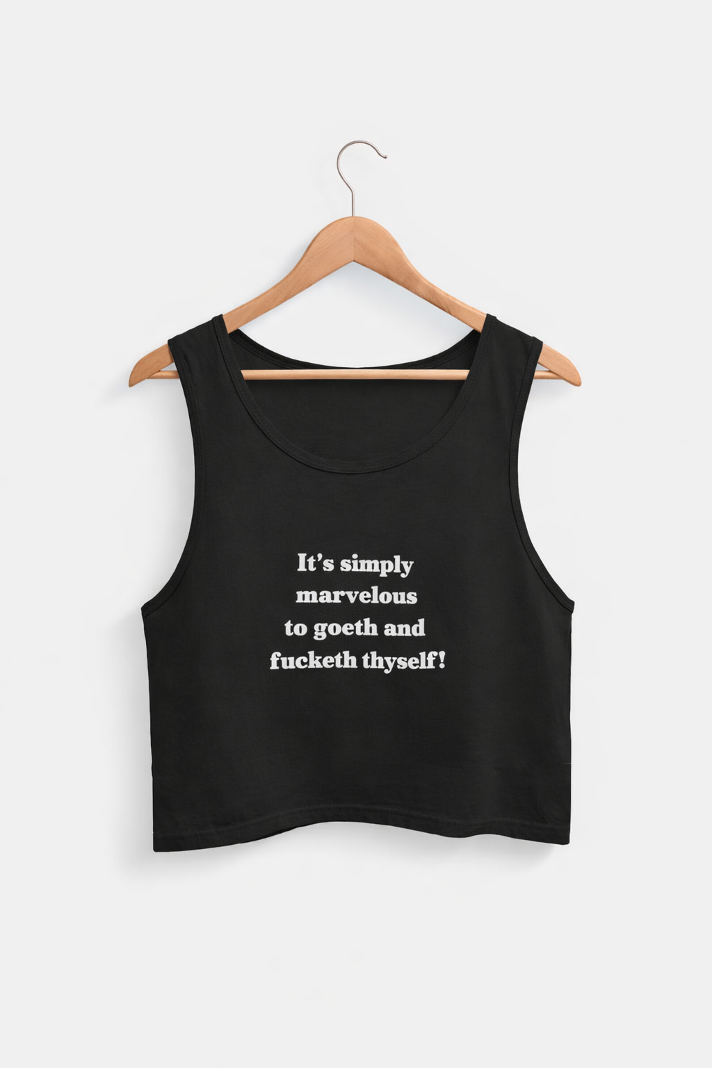 Black tank top with white text on a hanger against a white background