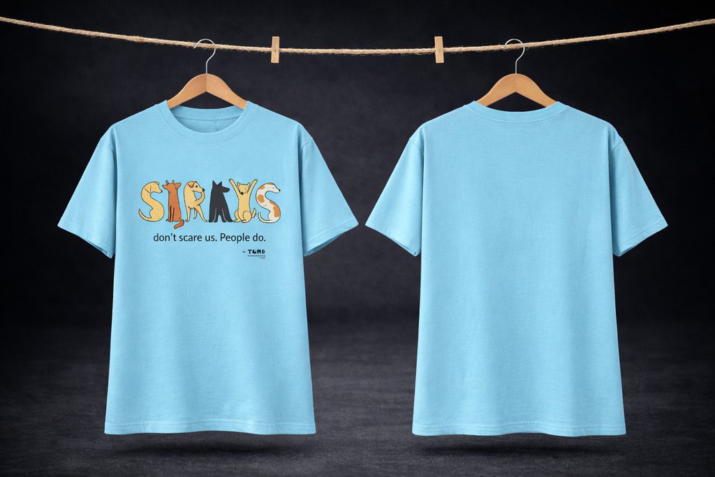 Light blue t-shirt with a graphic design and text on a dark background