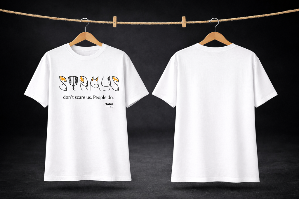 White t-shirt with text design on a dark background