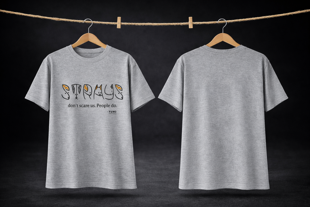 Gray t-shirt with text and graphics on a dark background