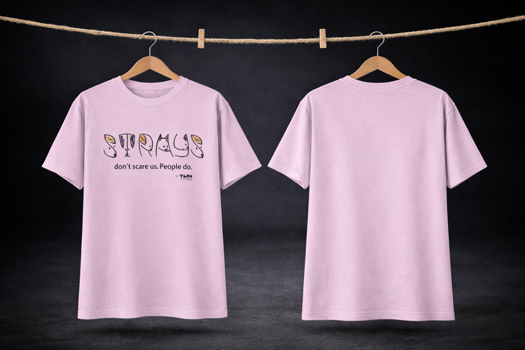 Pink t-shirt with text design on a dark background