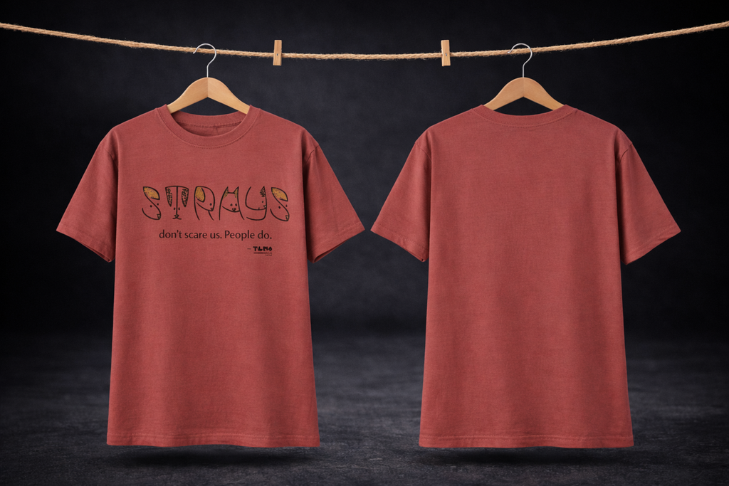 Red t-shirt with text on a hanger against a dark background