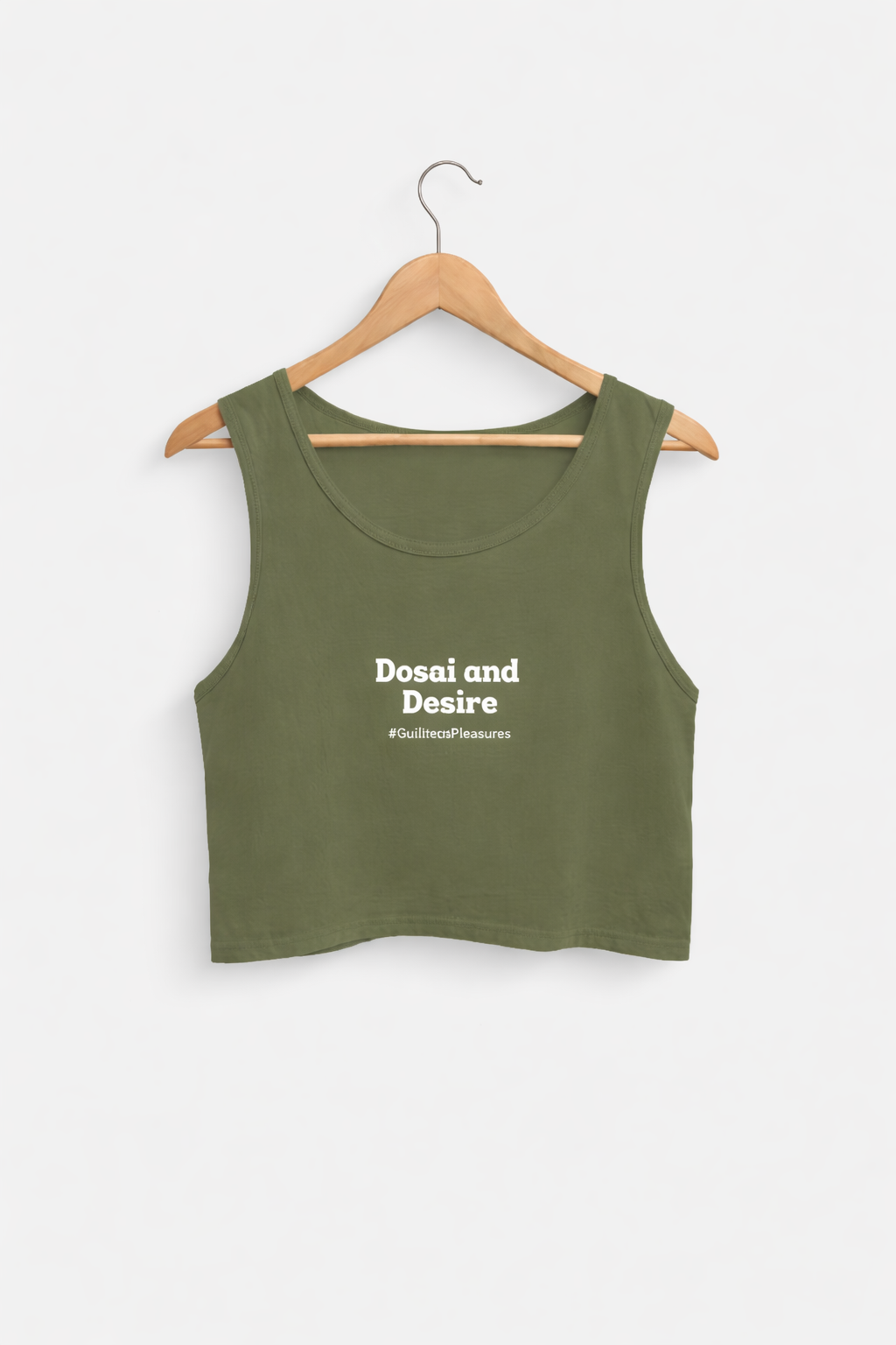Green tank top on a hanger with text 'Desire and Desires' on a white background