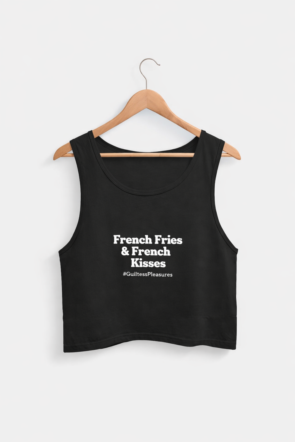 Black tank top with text on a hanger against a white background