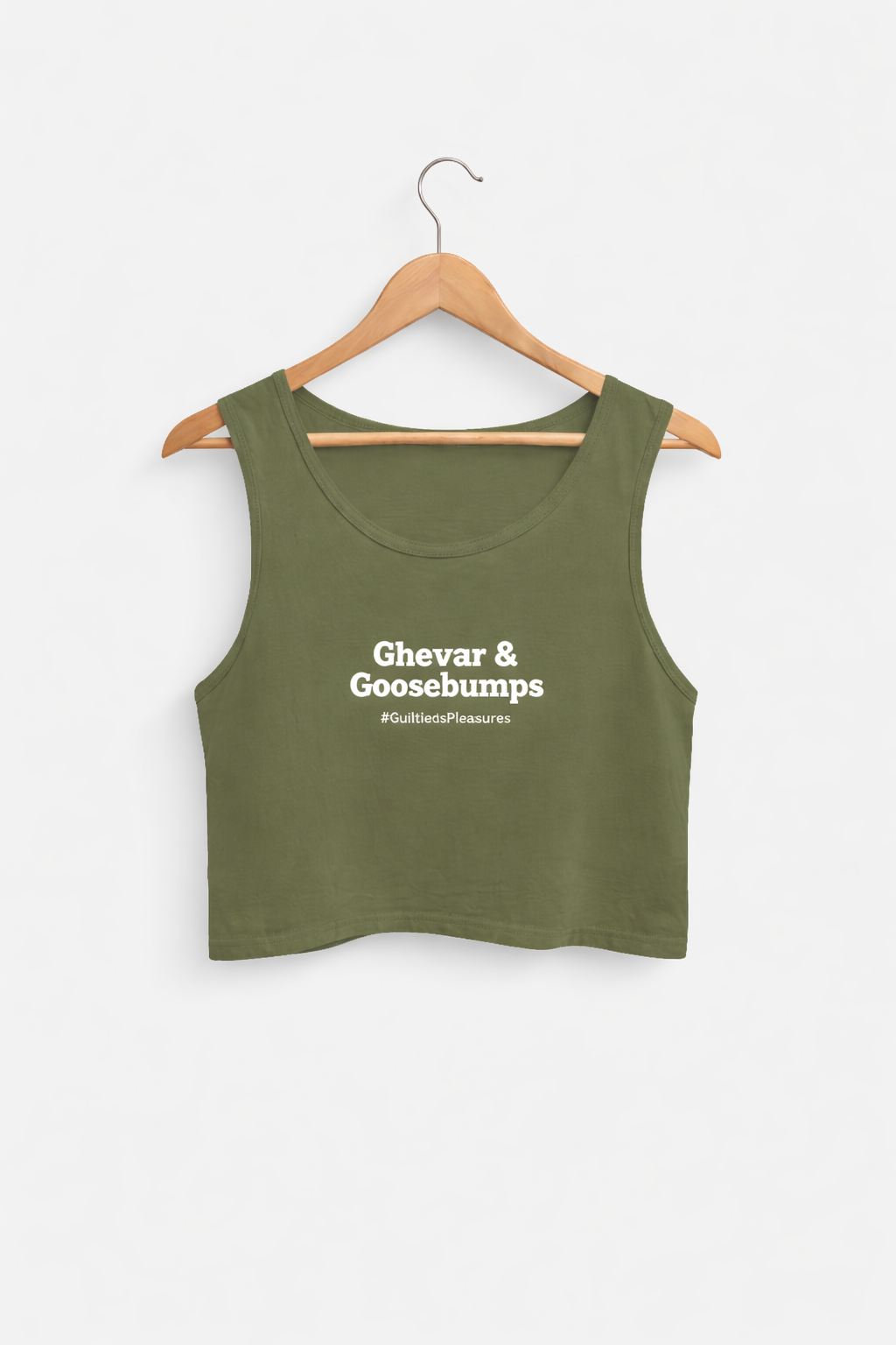 Green tank top on a hanger with text 'Ghevar & Goosebumps' on a white background