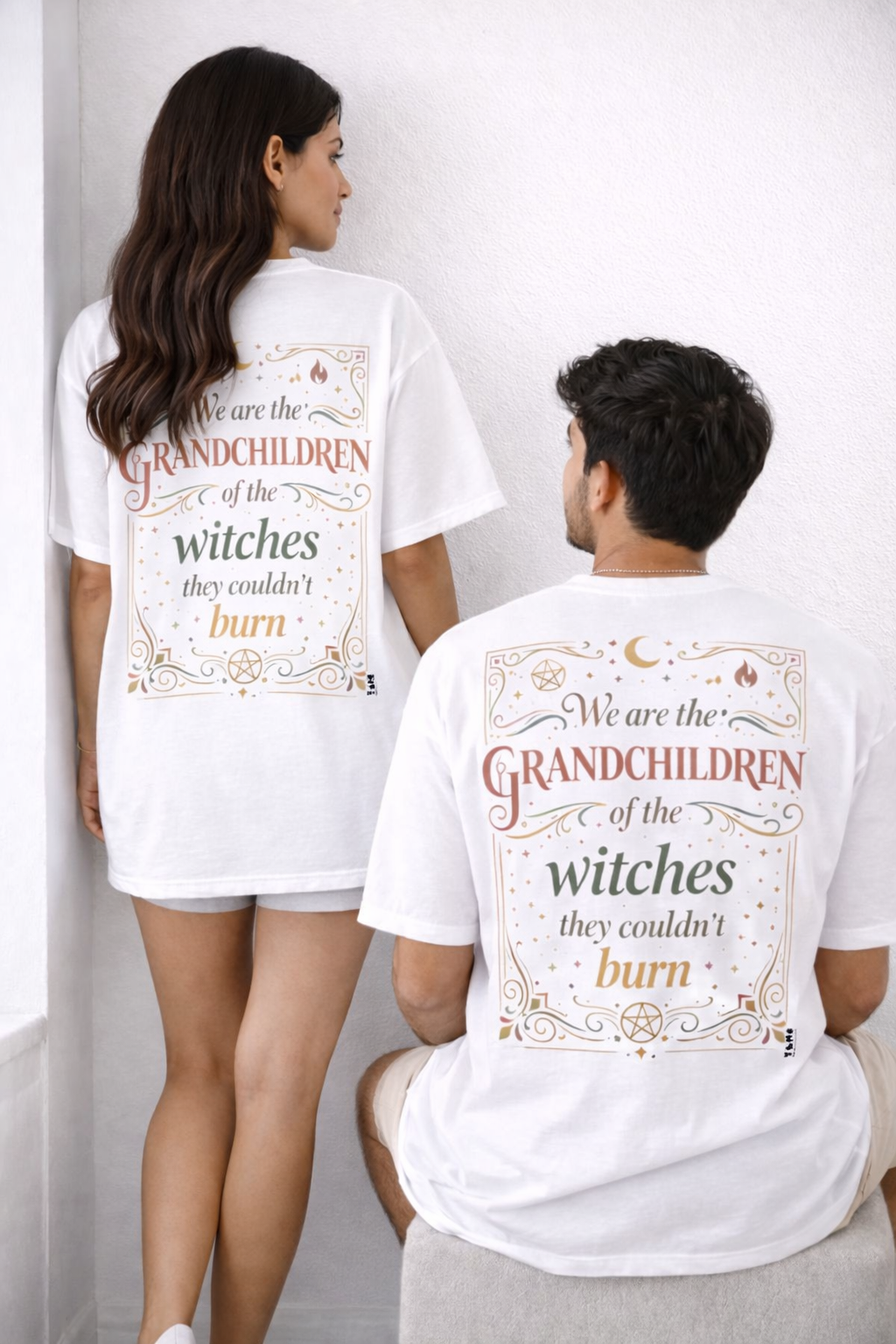 Two people wearing white t-shirts with a humorous text design.