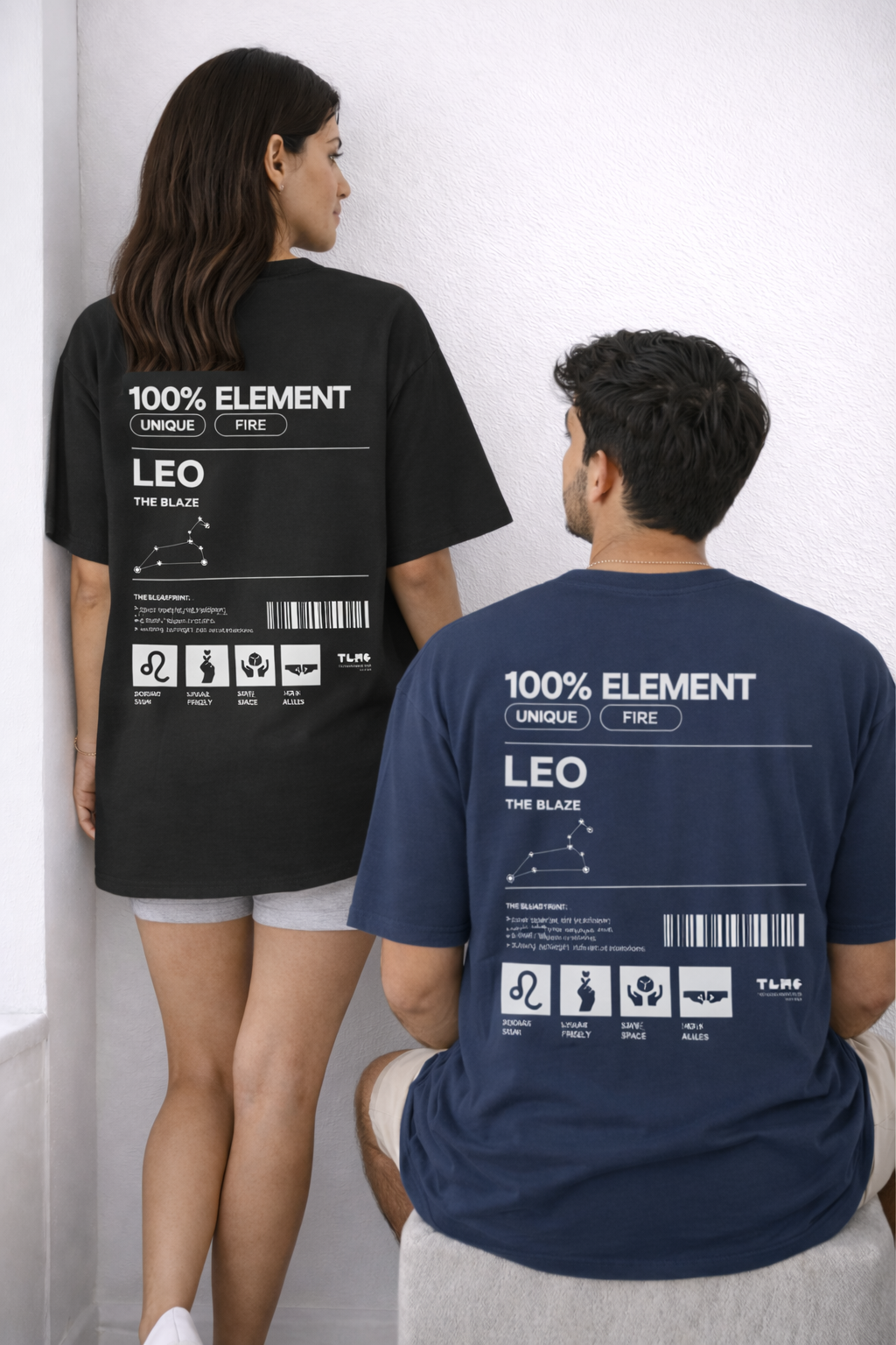 Two people wearing t-shirts with '100% Element' design on the back.