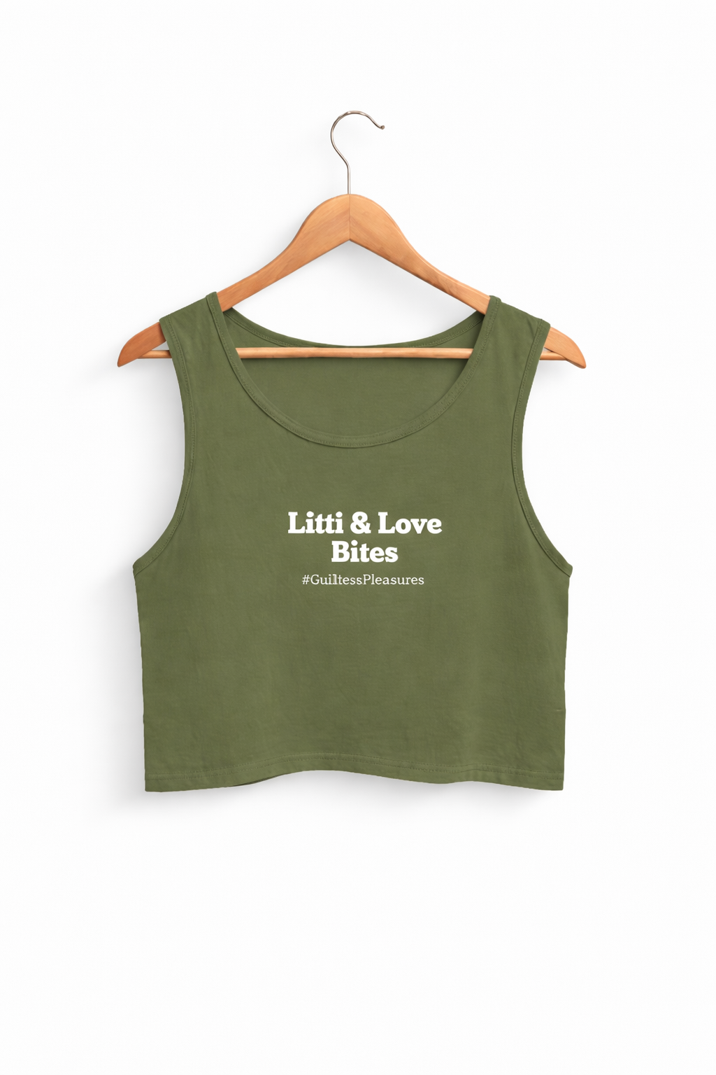 Green tank top with text on a hanger against a white background