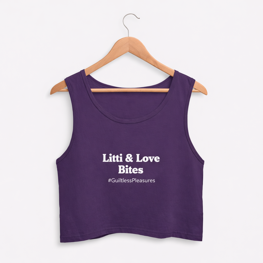 Purple tank top with text on a hanger against a white background