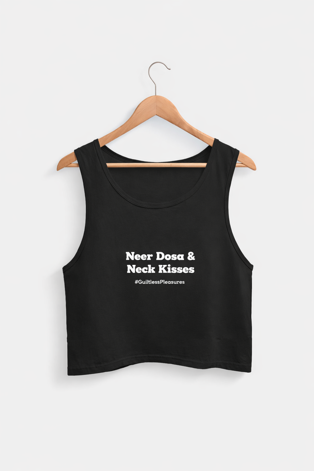 Black tank top with text on a hanger against a white background