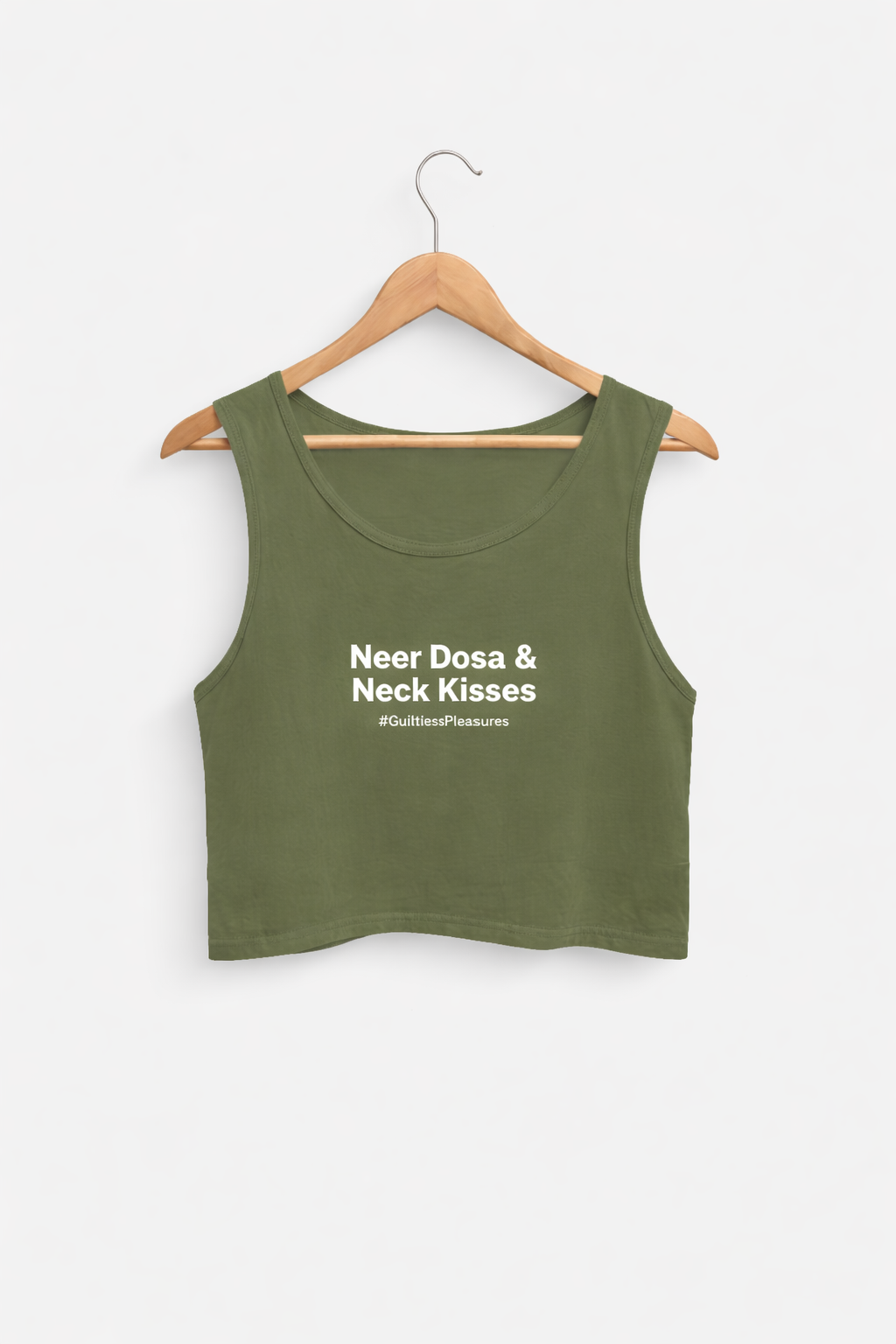 Green tank top with text on a hanger against a white background