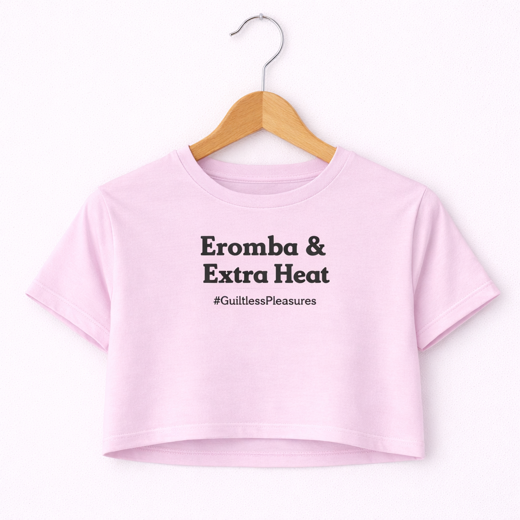 Pink crop top with text on a hanger against a white background