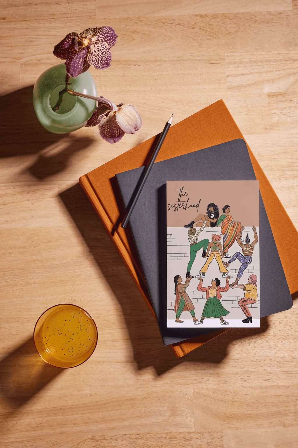 The Sisterhood notebook horizontal mockup - It Takes A Village A5 journal celebrating women empowerment
