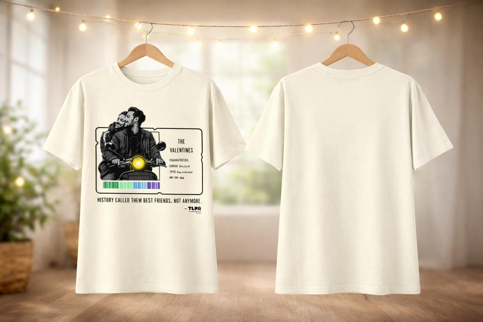 White t-shirt with graphic design on a hanger against a neutral background