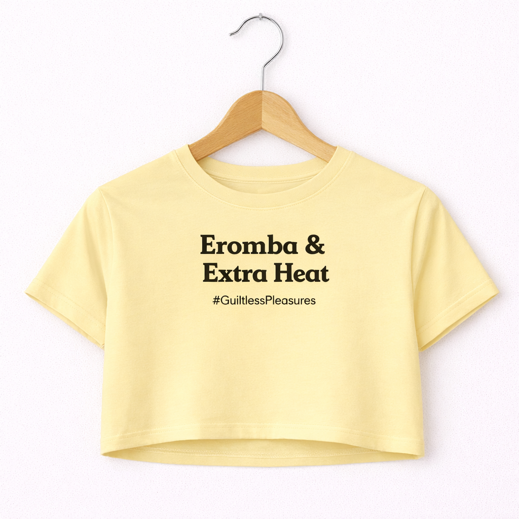 Yellow crop top with text on a hanger against a white background