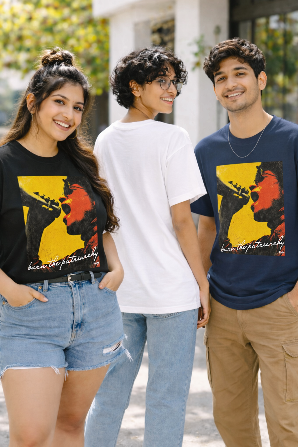 Three people wearing t-shirts with a graphic design and text.
