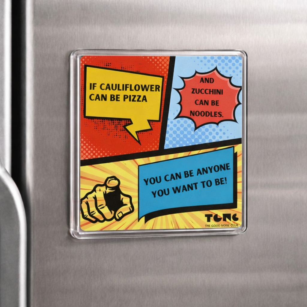 Fridge magnet with comic-style text on a metallic surface