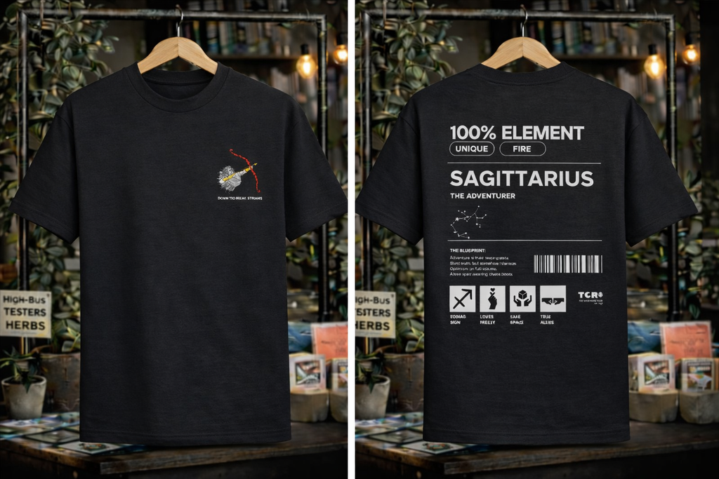 Black t-shirt with zodiac design on a wooden hanger against a store background