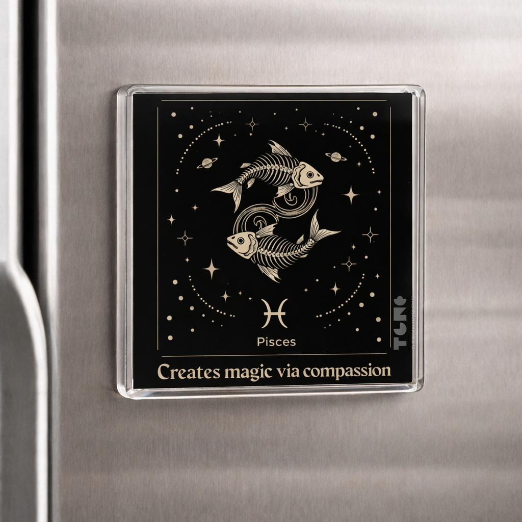 Fridge magnet with Pisces zodiac sign design on a metallic surface